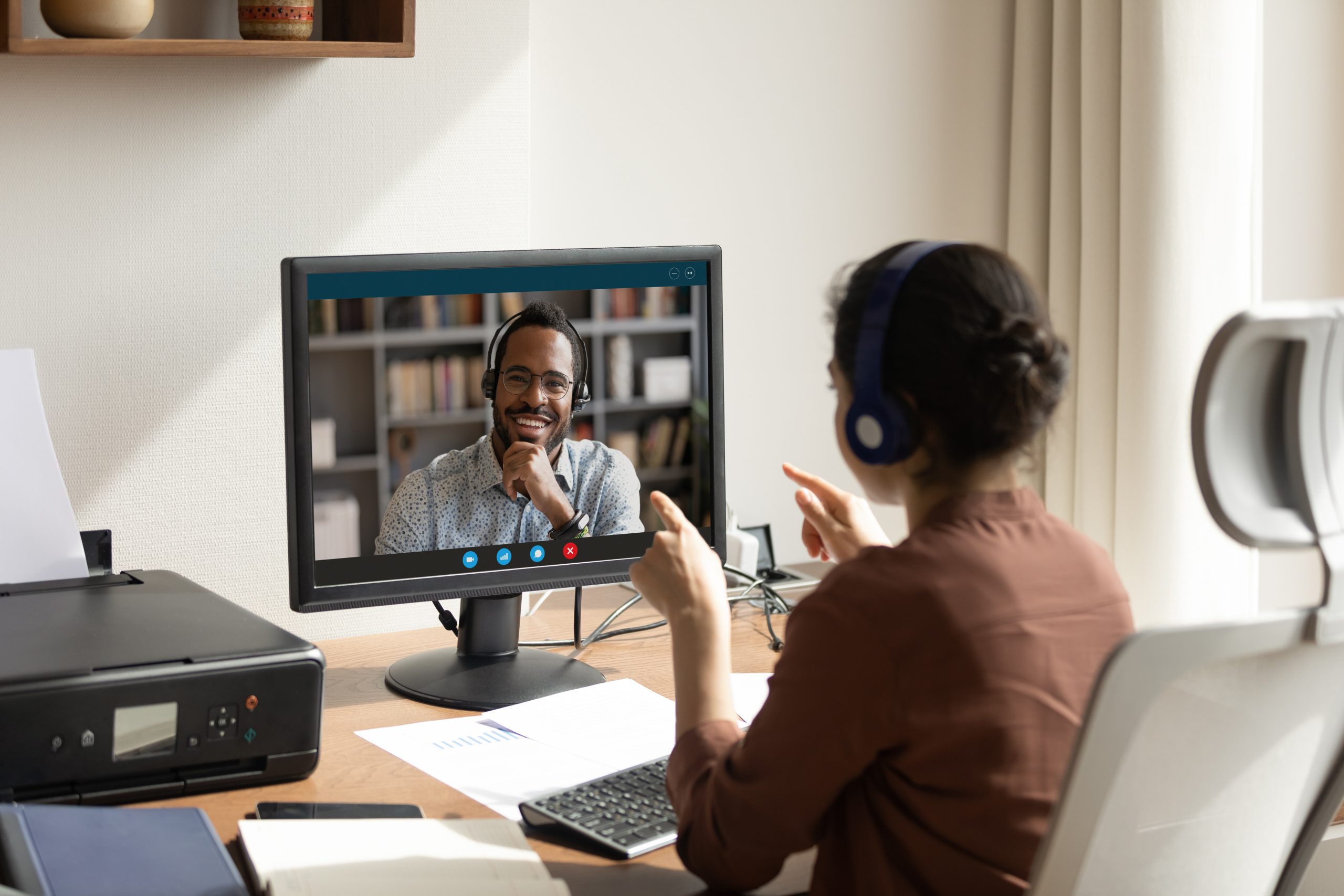 Woman and man having a online coaching session