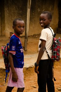 Children with backpacks on for school